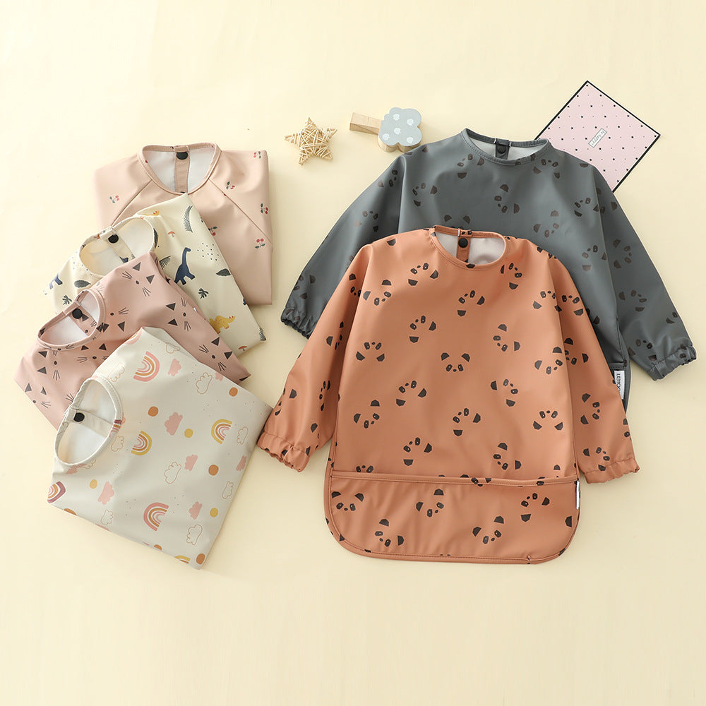 https://www.mamatoddler.com/cdn/shop/files/Long-Sleeves-Waterproof-Baby-Bibs-with-Bottom-Pocket-Mama-Toddler-37.jpg?v=1691689695