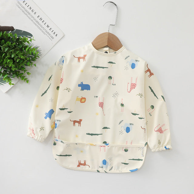 https://www.mamatoddler.com/cdn/shop/files/Long-Sleeves-Waterproof-Baby-Bibs-with-Bottom-Pocket-Mama-Toddler-Forest-Animals-4-Small-For-6-12-Months-5.jpg?v=1691689578