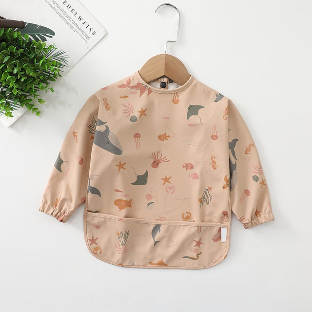 https://www.mamatoddler.com/cdn/shop/files/Long-Sleeves-Waterproof-Baby-Bibs-with-Bottom-Pocket-Mama-Toddler-Marine-Animals-Small-For-6-12-Months-6.jpg?v=1691689581