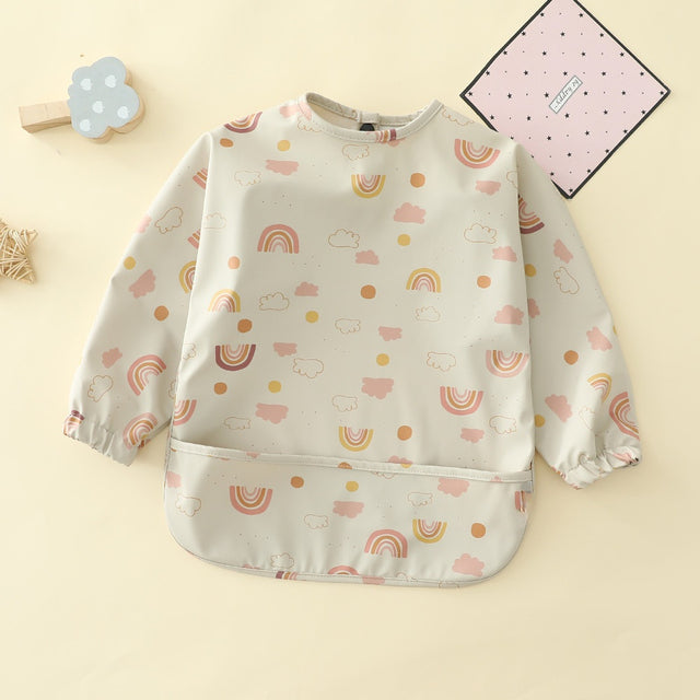 https://www.mamatoddler.com/cdn/shop/files/Long-Sleeves-Waterproof-Baby-Bibs-with-Bottom-Pocket-Mama-Toddler-Rainbows-2-Small-For-6-12-Months-12.jpg?v=1691689604